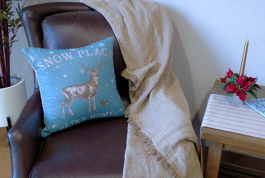 Rennie & Rose Snow place Like Home Stag Pillow for the holidays.