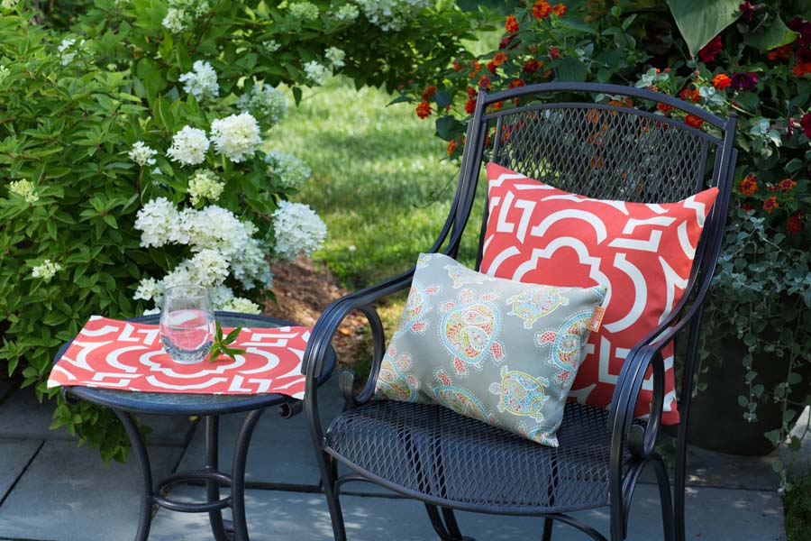 Rennie & Rose Carmody Placemat and Pillow in Mango