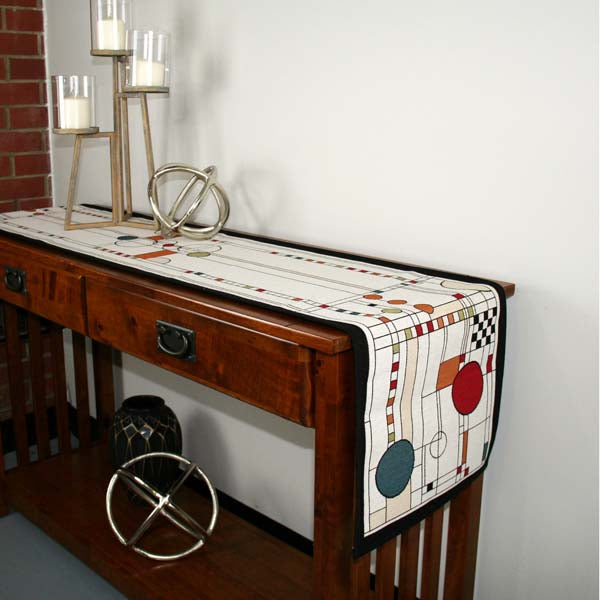 This unique design draws inspiration from the art of Calder and the beauty of contemporary stained-glass windows. A background of varied squares and rectangles forms an intricate grid, layered with scattered circles to create a sense of depth and movement. 