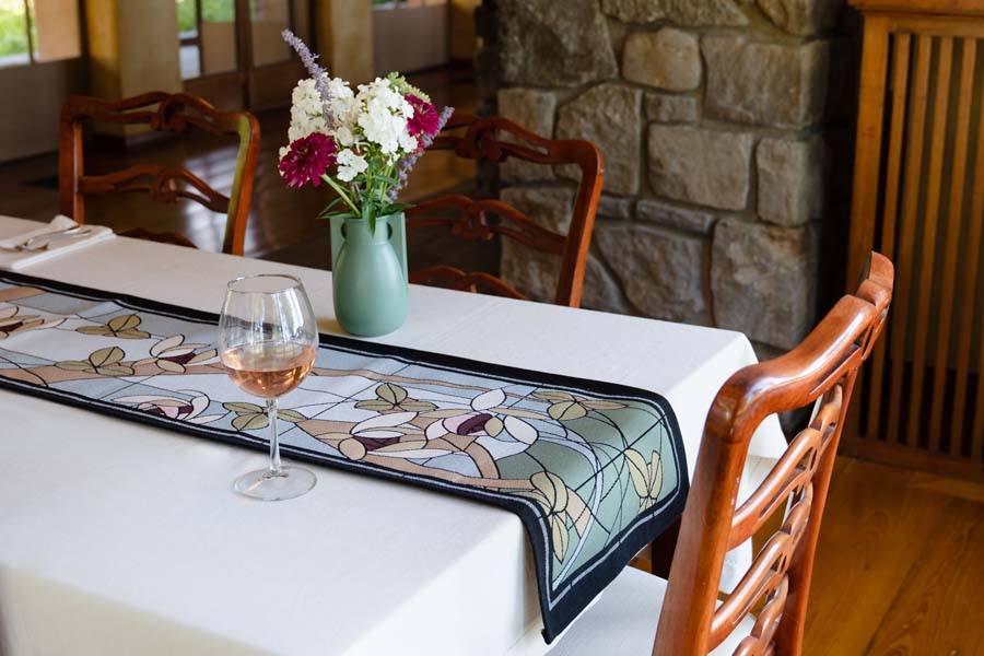 Flowers and Vines Crystal Table Runner displayed here at the Frank Lloyd Wright Graycliff Estate in Buffalo, NY.