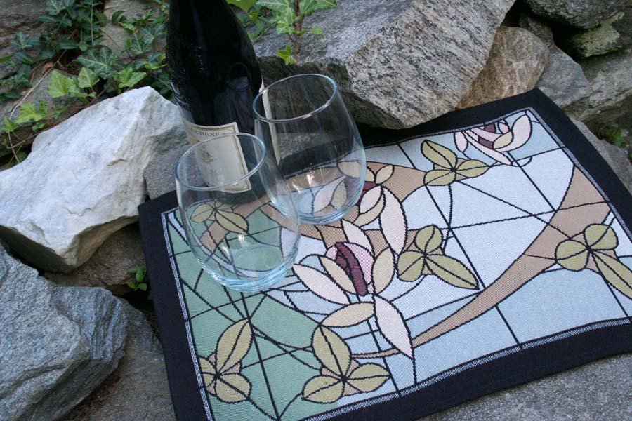 Close-up of Flowers & Vines Crystal placemat showing woven floral pattern and craftsmanship.