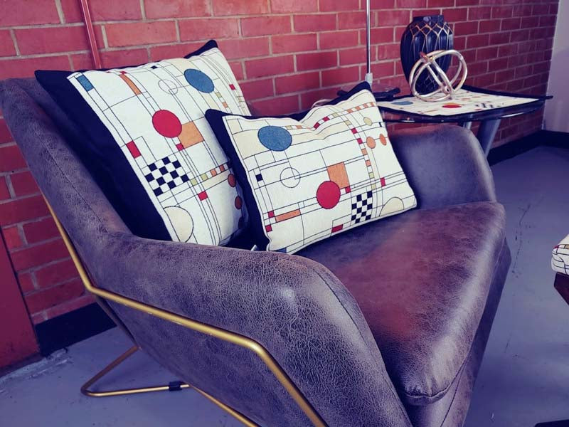 Rennie & Rose Exclusive Circle Study Pillows available in 2 sizes with matching placemats and a table runner.