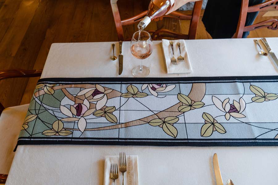 Flowers and Vines Crystal Table Runner shown here at the Frank Lloyd Wright Graycliff Estate in Buffalo, NY.