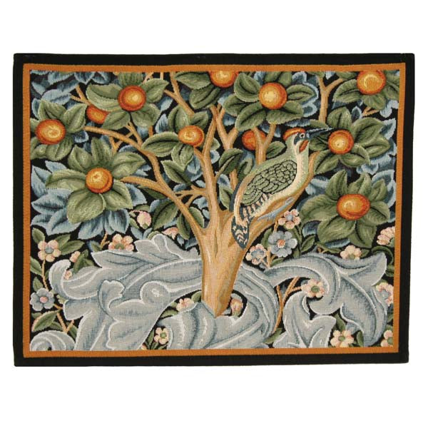 Jacquard fabric inspired by William Morris’s 1885 Woodpecker tapestry, this placemat is woven with rich colors and intricate detail for Rennie & Rose