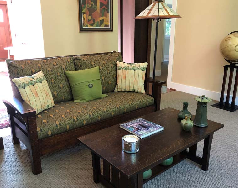 Rennie & Rose Exclusive Charles Rennie MacIntosh Ginkgo Window Pillow in a living room.