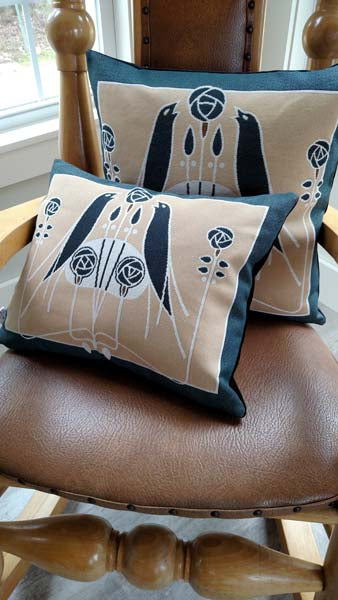 Birds of a Feather Pillows on a chair