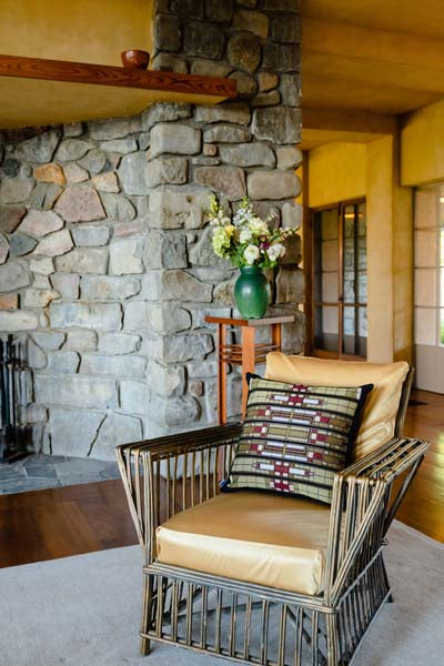 Rennie & Rose Louis Sullivan Skylight Pillows on a chair at Graycliff in Buffalo NY